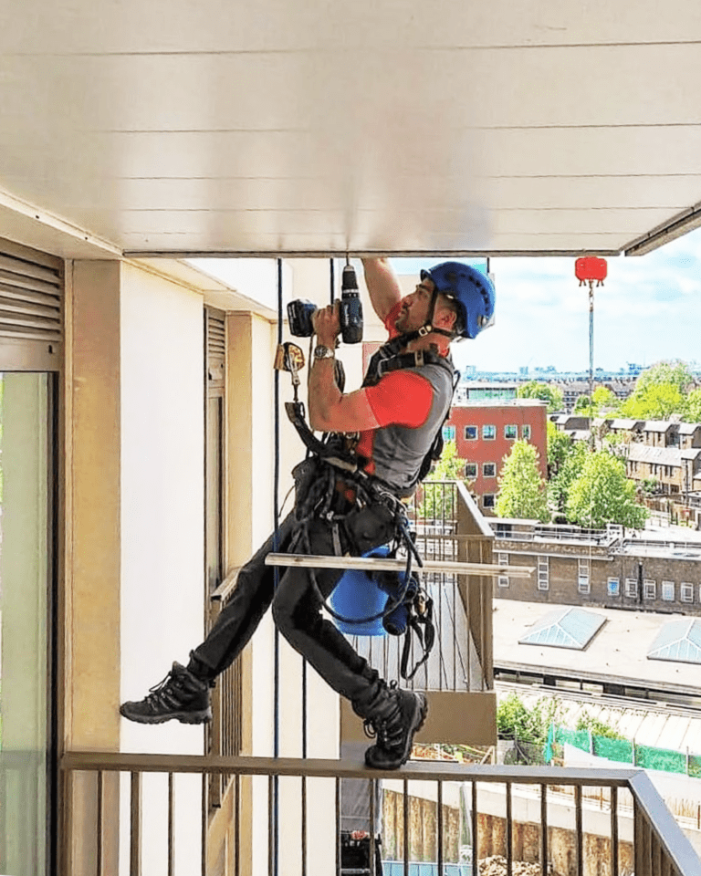 Technician for working at height in building eyes bolt installation service, high altitude special services